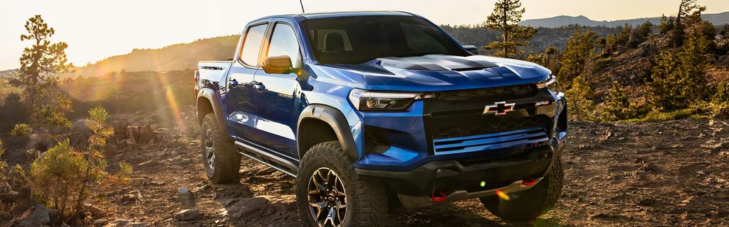 a blue 2026 Chevrolet Colorado truck parked outside in Michigan